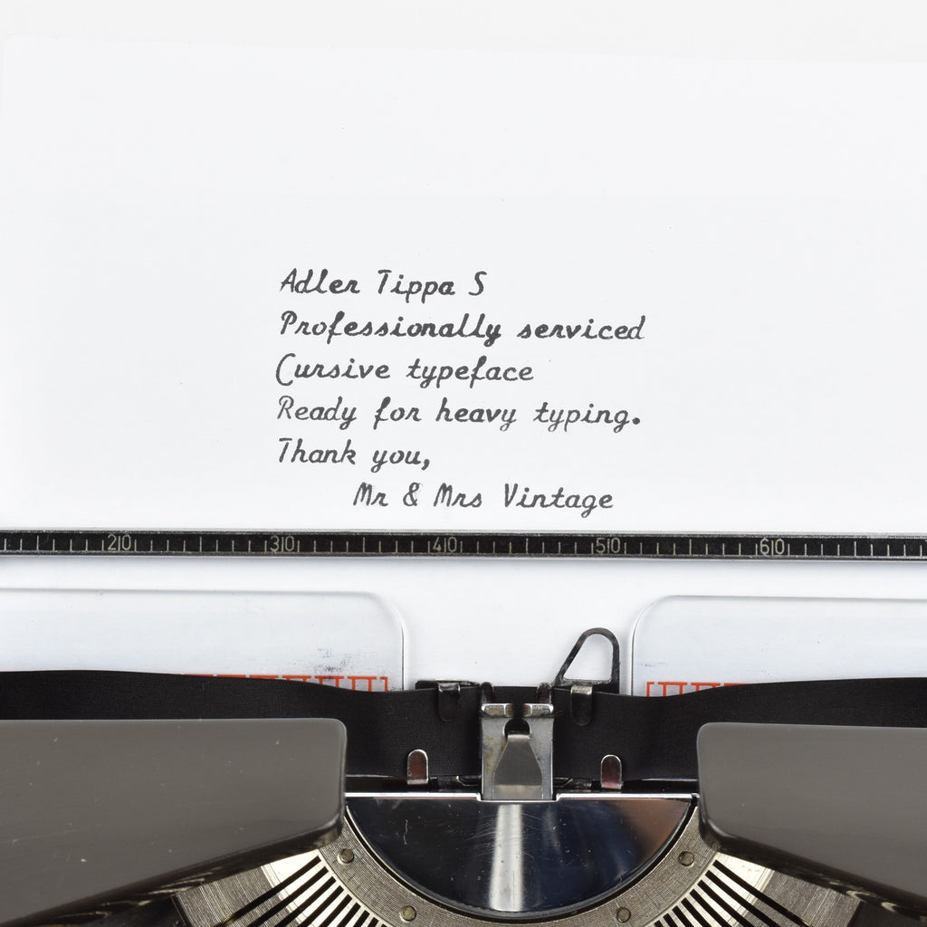 Adler Tippa S Typewriter typeface Cursive